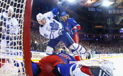 NEW YORK, NEW YORK – DECEMBER 15: Igor Shesterkin #31 of the New York Rangers defends the net against Mitchell Marner #16 of the Toronto Maple Leafs during the second period at Madison Square Garden on December 15, 2022, in New York City. The Rangers defeated the Leafs 3-1. Marner’s 23-game point streak ended in this game. (Photo by Bruce Bennett/Getty Images)