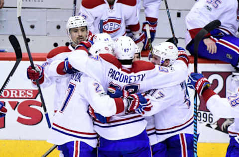 Feb 9, 2017; Glendale, AZ, USA; Montreal Canadiens left wing Max Pacioretty (67) celebrates with teammates after beating the Arizona Coyotes 5-4 in overtime at Gila River Arena. Mandatory Credit: Matt Kartozian-USA TODAY Sports