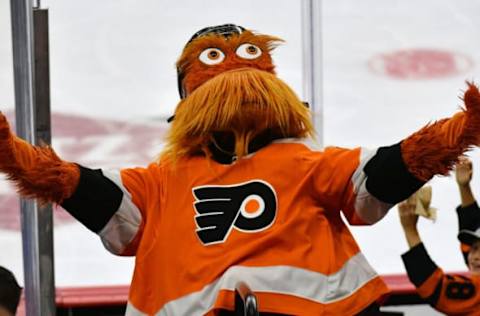 Oct 4, 2021; Philadelphia, Pennsylvania, USA; Philadelphia Flyers mascot Gritty performs against the Boston Bruins during the third period at Wells Fargo Center. Mandatory Credit: Eric Hartline-USA TODAY SportsEd Sn