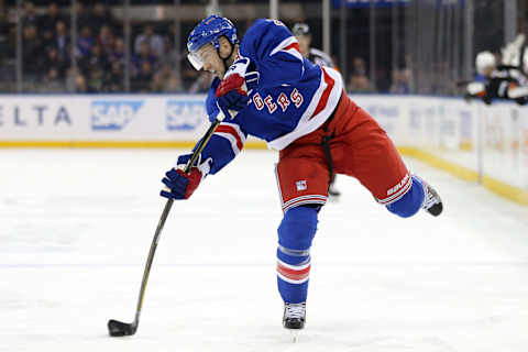 Feb 7, 2017; New York, NY, USA; New York Rangers center Derek Stepan (21) takes a shot against the Anaheim Ducks during the second period at Madison Square Garden. Mandatory Credit: Brad Penner-USA TODAY Sports