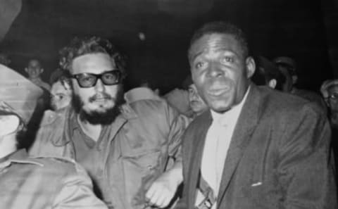 Cuban Prime Minister Fidel Castro is shown with baseball great Minnie Minoso during winter baseball game in Gran Stadium circa 1960..