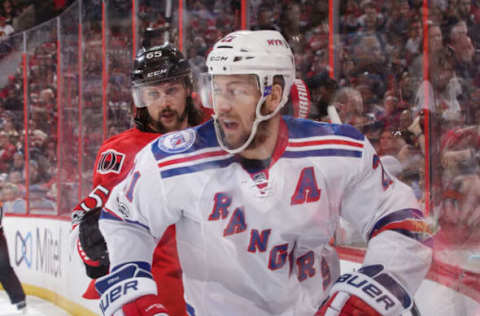 OTTAWA, ON – APRIL 29: Erik Karlsson #65 of the Ottawa Senators skates after Derek Stepan #21 of the New York Rangers in the corner in the first period in Game Two of the Eastern Conference Second Round during the 2017 NHL Stanley Cup Playoffs at Canadian Tire Centre on April 29, 2017, in Ottawa, Ontario, Canada. (Photo by Jana Chytilova/Freestyle Photography/Getty Images)