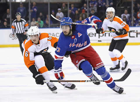 NEW YORK, NEW YORK – MARCH 01: Mika Zibanejad #93 of the New York Rangers skates against the Philadelphia Flyers at Madison Square Garden on March 01, 2020 in New York City. The Flyers defeated the Rangers 5-3. (Photo by Bruce Bennett/Getty Images)