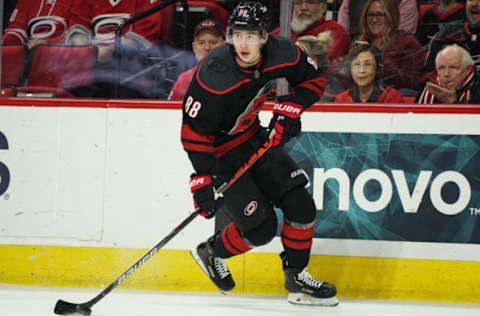 RALEIGH, NC – JANUARY 10: Carolina Hurricanes Right Wing Martin Necas (88) skates the puck up ice during a game between the Arizona Coyotes and the Carolina Hurricanes on January 10, 2019, at the PNC Arena in Raleigh, NC. (Photo by Greg Thompson/Icon Sportswire via Getty Images)