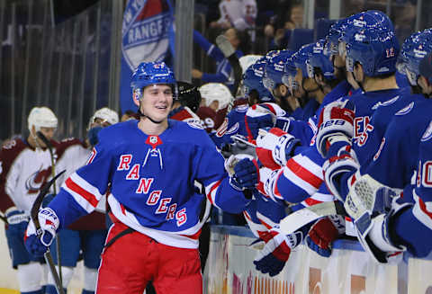 NEW YORK, NEW YORK – DECEMBER 08: Nils Lundkvist #27 of the New York Rangers celebrates his first NHL goal at 18:15 of the first period against the Colorado Avalanche at Madison Square Garden on December 08, 2021, in New York City. (Photo by Bruce Bennett/Getty Images)