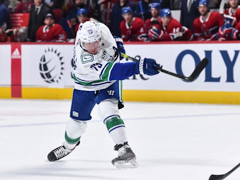 MONTREAL, QC – FEBRUARY 25: Tyler Toffoli #73 of the Vancouver Canucks takes a shot against the Montreal Canadiens during the third period at the Bell Centre on February 25, 2020 in Montreal, Canada. The Vancouver Canucks defeated the Montreal Canadiens 4-3 in overtime. (Photo by Minas Panagiotakis/Getty Images)