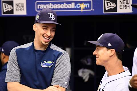 ST PETERSBURG, FL – SEPTEMBER 28: Blake Snell #4 and Joey Wendle #18 of the Tampa Bay Rays interact before accepting awards prior to a game against the Toronto Blue Jays on September 28, 2018 at Tropicana Field in St Petersburg, Florida. (Photo by Julio Aguilar/Getty Images)