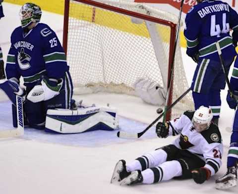 Feb 15, 2016; Vancouver, British Columbia, CAN; Minnesota Wild forward Nino Niederreiter (22) reacts after scoring against Vancouver Canucks goaltender Jacob Markstrom (25) during the third period at Rogers Arena. The Minnesota Wild won 5-2. Mandatory Credit: Anne-Marie Sorvin-USA TODAY Sports