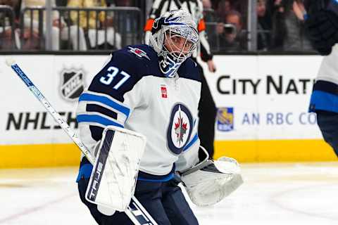 Apr 27, 2023; Las Vegas, Nevada, USA; Winnipeg Jets goaltender Connor Hellebuyck (37) defends his net against the Vegas Golden Knights during the second period of game five of the first round of the 2023 Stanley Cup Playoffs at T-Mobile Arena. Mandatory Credit: Stephen R. Sylvanie-USA TODAY Sports