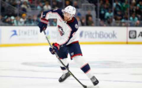 SEATTLE, WASHINGTON – JANUARY 28: Vladislav Gavrikov #4 of the Columbus Blue Jackets shoots during the third period against the Seattle Kraken at Climate Pledge Arena on January 28, 2023 in Seattle, Washington. (Photo by Steph Chambers/Getty Images)