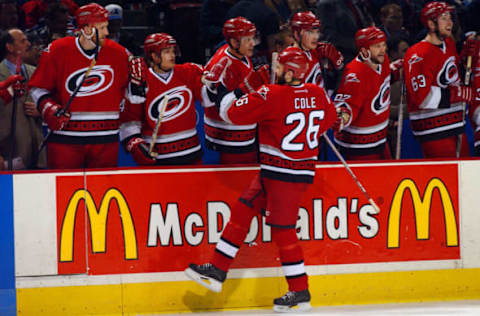 MONTREAL, CAN – MAY 13: Erik Cole #26 of the Carolina Hurricanes celebrates one of his goals with his teammates during game six of the Eastern Conference Semifinal series of the NHL Stanley Cup Playoffs between the Carolina Hurricanes and the Montreal Canadiens at the Molson Centre in Montreal, Canada on May 13, 2002. (Photo by Dave Sandford/Getty Images/NHLI)