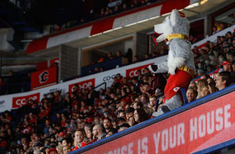 CALGARY, AB – OCTOBER 21: Harvey the Hound, of the Calgary Flames cheers the fans in an NHL game against the Minnesota Wild at the Scotiabank Saddledome on October 21, 2017 in Calgary, Alberta, Canada. (Photo by Gerry Thomas/NHLI via Getty Images)