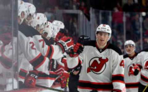 Sep 26, 2016; Montreal, Quebec, CAN; New Jersey Devils forward Michael McLeod (41) reacts with teammates after scoring a goal against the Montreal Canadiens during the third period of a preseason hockey game at the Bell Centre. Mandatory Credit: Eric Bolte-USA TODAY Sports