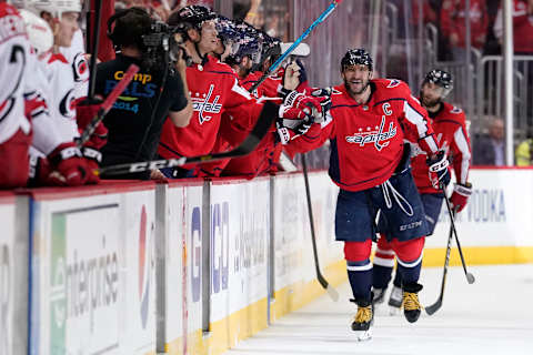 WASHINGTON, DC – APRIL 20: Alex Ovechkin #8 of the Washington Capitals celebrates after Brett Connolly #10 scored a goal in the second period against the Carolina Hurricanes in Game Five of the Eastern Conference First Round during the 2019 NHL Stanley Cup Playoffs at Capital One Arena on April 20, 2019 in Washington, DC. (Photo by Patrick McDermott/NHLI via Getty Images)