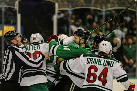 DALLAS, TX – JANUARY 24: Minnesota Wild defenseman Ryan Suter (20) and Dallas Stars left wing Jamie Benn (14) get into a scuffle during the game between the Dallas Stars and the Minnesota Wild on January 24, 2017 at the American Airlines Center in Dallas, Texas. Minnesota defeats Dallas 3-2 in a shootout. (Photo by Matthew Pearce/Icon Sportswire via Getty Images)