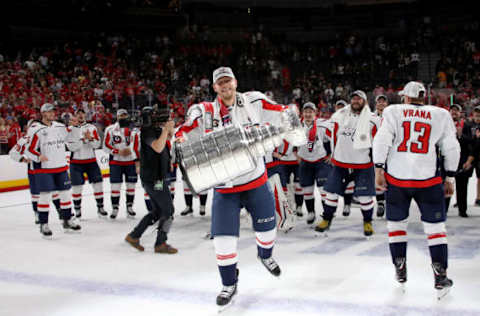 LAS VEGAS, NV: Alex Chiasson #39 of the Washington Capitals hoists the Stanley Cup after his team defeated the Vegas Golden Knights 4-3 in Game Five of the 2018 NHL Stanley Cup Final on June 7, 2018. (Photo by Bruce Bennett/Getty Images)