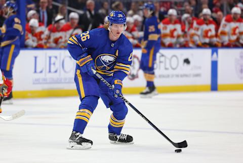 Feb 11, 2023; Buffalo, New York, USA; Buffalo Sabres defenseman Rasmus Dahlin (26) looks to make a pass during the second period against the Calgary Flames at KeyBank Center. Mandatory Credit: Timothy T. Ludwig-USA TODAY Sports