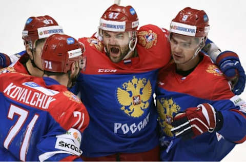 Russia’s forward Alexander Radulov (C) celebrates a goal with his teammmates during a Channel One Cup hockey match of the Euro Hockey Tour between Russia and Czech Republic in Moscow on December 20, 2015. / AFP / ALEXANDER NEMENOV (Photo credit should read ALEXANDER NEMENOV/AFP via Getty Images)