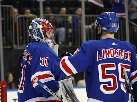 NEW YORK, NEW YORK – JANUARY 31: Igor Shesterkin #31 and Ryan Lindgren #55 of the New York Rangers celebrate their 4-2 victory over the Detroit Red Wings at Madison Square Garden on January 31, 2020 in New York City. (Photo by Bruce Bennett/Getty Images)