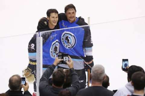 TORONTO, ON- NOVEMBER 12 – Former Anaheim Ducks heroes, Paul Kariya and Teemu Selanne pose for fans after the Hockey Hall of Fame Legends Classic. (Steve Russell/Toronto Star via Getty Images)