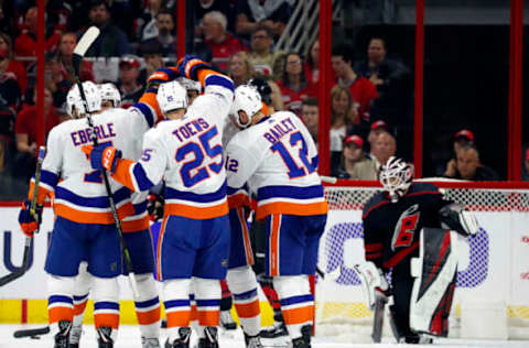 RALEIGH, NC – May 1: The New York Islanders celebrate a goal in Game Three of the Eastern Conference Second Round against the Carolina Hurricanes during the 2019 NHL Stanley Cup Playoffs at PNC Arena on May 1, 2019, in Raleigh, North Carolina. (Photo by Karl B DeBlaker/NHLI via Getty Images)