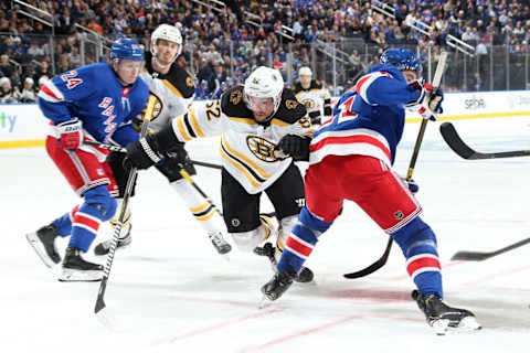 NEW YORK, NY – OCTOBER 27: Sean Kuraly #52 of the Boston Bruins skates against Brett Howden #21 and Kaapo Kakko #24 of the New York Rangers at Madison Square Garden on October 27, 2019 in New York City. (Photo by Jared Silber/NHLI via Getty Images)