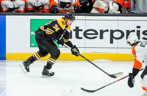 Jan 23, 2021; Boston, Massachusetts, USA; Boston Bruins left wing Jake DeBrusk (74) looks to pass during the first period against the Philadelphia Flyers at TD Garden. Mandatory Credit: Paul Rutherford-USA TODAY Sports