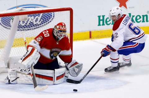 Apr 3, 2017; Sunrise, FL, USA; Florida Panthers goalie Reto Berra (20) makes a save against Montreal Canadiens left wing Artturi Lehkonen (62) in the second period at BB&T Center. Mandatory Credit: Robert Mayer-USA TODAY Sports