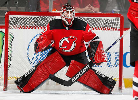 NEWARK, NJ – NOVEMBER 26: Louis Domingue #70 of the New Jersey Devils defends his net during the game against the Minnesota Wild at the Prudential Center on November 26, 2019 in Newark, New Jersey. (Photo by Andy Marlin/NHLI via Getty Images)”n”n”n