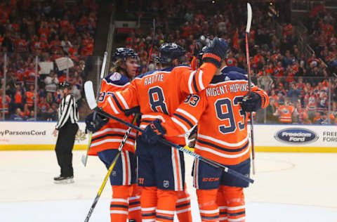 EDMONTON, AB – DECEMBER 27: Edmonton Oilers Left Wing Ryan Nugent-Hopkins (93) celebrates a power play goal with his line mates in the first period during the Edmonton Oilers game versus the Vancouver Canucks on December 27, 2018 at Rogers Place in Edmonton, AB. (Photo by Curtis Comeau/Icon Sportswire via Getty Images)