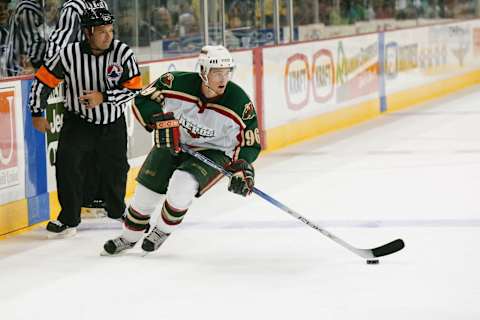 SAN ANTONIO – OCTOBER 15: Pierre-Marc Bouchard #96 of the Houston Aeros stickhandles… (Photo by Darren Abate/Getty Images)