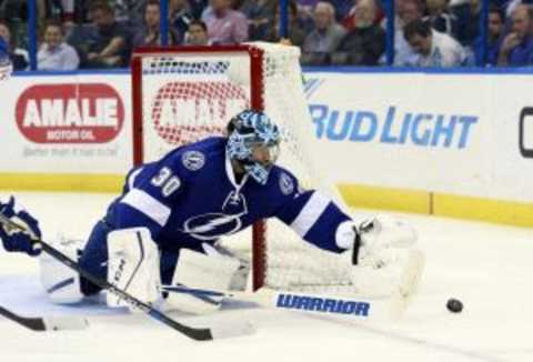 Feb 3, 2016; Tampa, FL, USA;Tampa Bay Lightning goalie Ben Bishop (30) makes a save against the Detroit Red Wings during the third period at Amalie Arena. Tampa Bay defeated Detroit 3-1. Mandatory Credit: Kim Klement-USA TODAY Sports