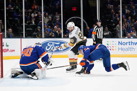 UNIONDALE, NY – DECEMBER 05: Vegas Golden Knights Center Chandler Stephenson (20) takes a shot on goal with New York Islanders Goalie Semyon Varlamov (40) making the save during the first period of the National Hockey League game between the Las Vegas Golden Knights and the New York Islanders on December 5, 2019, at the Nassau Veterans Memorial Coliseum in Uniondale, NY. (Photo by Gregory Fisher/Icon Sportswire via Getty Images)