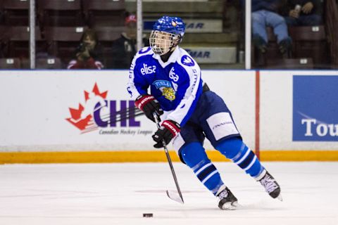 SARNIA, ON – NOVEMBER 02: Tarmo Reunanen #8 of Finland moves the puck against Canada White during the World Under-17 Hockey Challenge on November 2, 2014 at the RBC Centre in Sarnia, Ontario. (Photo by Dennis Pajot/Getty Images)