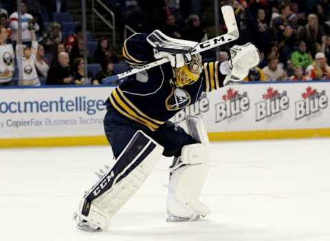 Oct 30, 2015; Buffalo, NY, USA; Buffalo Sabres goalie Linus Ullmark (35) celebrates after his first career NHL victory against the Philadelphia Flyers at First Niagara Center. The Sabers won 3-1. Mandatory Credit: Timothy T. Ludwig-USA TODAY Sports