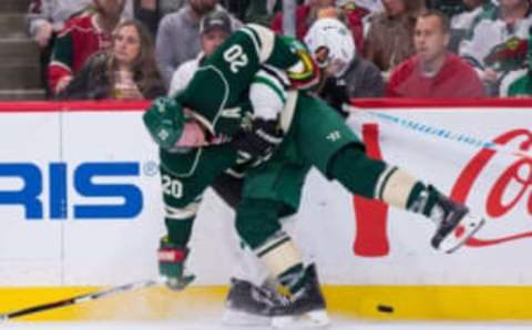 Oct 29, 2016; Saint Paul, MN, USA; Minnesota Wild defenseman Ryan Suter (20) checks Dallas Stars forward Devin Shore (17) in the second period at Xcel Energy Center. Mandatory Credit: Brad Rempel-USA TODAY Sports