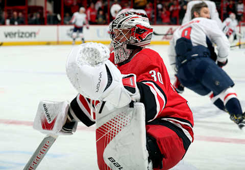 RALEIGH, NC – JANUARY 2: Cam Ward #30 of the Carolina Hurricanes participates in warmups prior to an NHL game against the Washington Capitals on January 2, 2018 at PNC Arena in Raleigh, North Carolina. (Photo by Gregg Forwerck/NHLI via Getty Images)