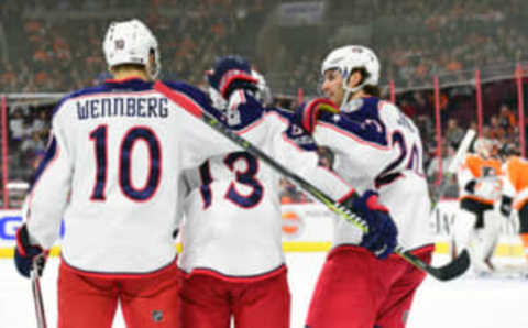 Columbus Blue Jackets right wing Cam Atkinson (13) celebrates his goal with center Alexander Wennberg (10) and left wing Brandon Saad (20) against Philadelphia Flyers (Eric Hartline-USA TODAY Sports)