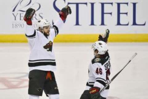 Apr 18, 2015; St. Louis, MO, USA; Minnesota Wild defenseman Marco Scandella (6) celebrates with Jared Spurgeon (46) after scoring a goal against the St. Louis Blues during the second period in game two of the first round of the the 2015 Stanley Cup Playoffs at Scottrade Center. Mandatory Credit: Jasen Vinlove-USA TODAY Sports