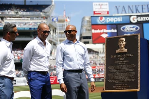 Aug 14, 2016; Bronx, NY, USA; Mariano Rivera (right) along with Derek Jeter (center) will be voted into the Baseball Hall of Fame in the next three years. They are pictured with former teammate Jorge Posada, who will also be voted upon. Mandatory Credit: Rich Shultz-Pool Photo via USA TODAY Sports