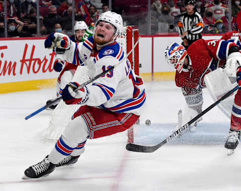 Oct 16, 2021; Montreal, Quebec, CAN; New York Rangers forward Alexis Lafreniere (13) celebrates after scoring a goal against Montreal Canadiens goalie Jake Allen (34) during the third period at the Bell Centre. Mandatory Credit: Eric Bolte-USA TODAY Sports