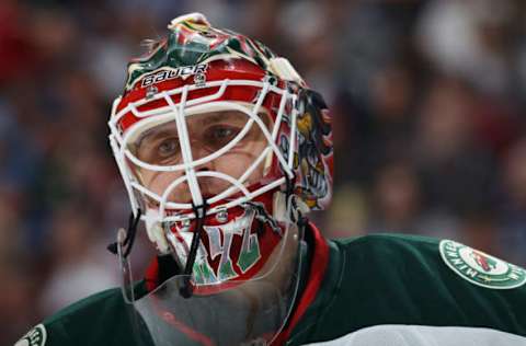 DENVER, CO – APRIL 17: Goalie Ilya Bryzgalov #30 of the Minnesota Wild looks on as he defends the goal against the Colorado Avalanche in Game One of the First Round of the 2014 NHL Stanley Cup Playoffs at Pepsi Center on April 17, 2014 in Denver, Colorado. The Avalanche defeated the Wild 5-4 in overtime to take a 1-0 game advantage in the series. (Photo by Doug Pensinger/Getty Images)