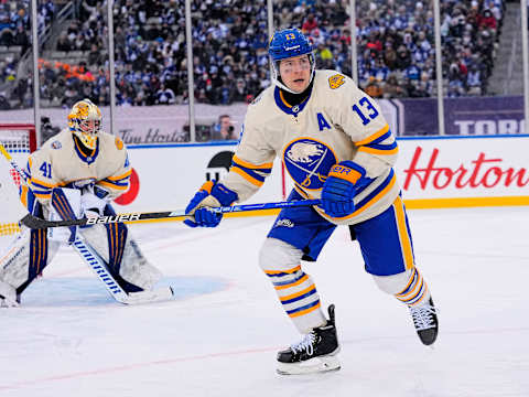 Mar 13, 2022; Hamilton, Ontario, CAN; Buffalo Sabres defenseman Mark Pysyk (13) skates against the Toronto Maple Leafs during the third period in the 2022 Heritage Classic ice hockey game at Tim Hortons Field. Mandatory Credit: John E. Sokolowski-USA TODAY Sports