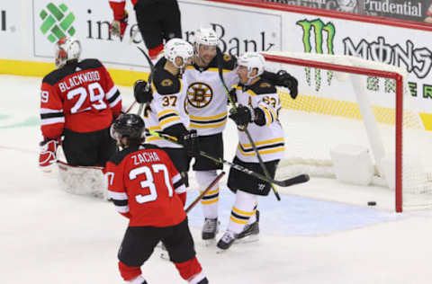 Jan 14, 2021; Newark, New Jersey, USA; The Boston Bruins celebrate a goal by Boston Bruins left wing Nick Ritchie (21) during the third period of their game against the New Jersey Devils at Prudential Center. Mandatory Credit: Ed Mulholland-USA TODAY Sports