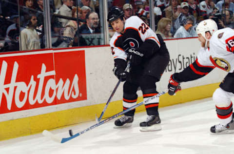 Dmitry Yushkevich, Philadelphia Flyers and Vaclav Varada, Ottawa Senators (Photo By Dave Sandford/Getty Images/NHLI)