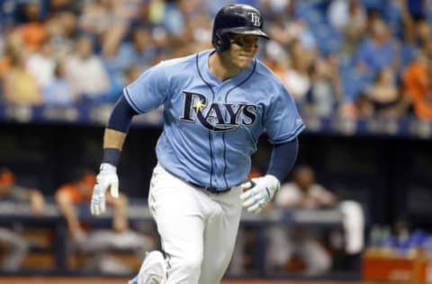 Jun 25, 2017; St. Petersburg, FL, USA; Tampa Bay Rays first baseman Logan Morrison (7) singles during the seventh inning against the Baltimore Orioles at Tropicana Field. Mandatory Credit: Kim Klement-USA TODAY Sports