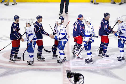 COLUMBUS, OH – APRIL 16: Players from the Columbus Blue Jackets and the Tampa Bay Lightning shake hands after Game Four of the Eastern Conference First Round during the 2019 NHL Stanley Cup Playoffs on April 16, 2019 at Nationwide Arena in Columbus, Ohio. Columbus defeated Tampa Bay 7-3 to win the series 4-0. (Photo by Kirk Irwin/Getty Images)