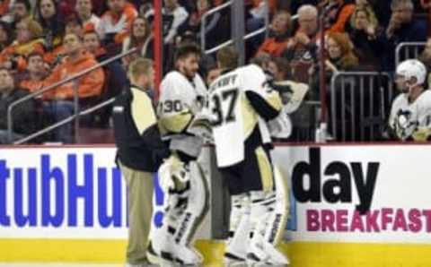 Apr 9, 2016; Philadelphia, PA, USA; Pittsburgh Penguins goalie Matt Murray (30) skates off the ice after a injury during the first period against the Philadelphia Flyers at Wells Fargo Center. Penguins goalie Jeff Zatkoff (37) replaced Murray. Mandatory Credit: Derik Hamilton-USA TODAY Sports