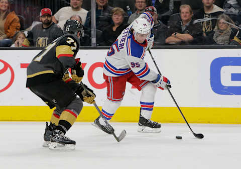 LAS VEGAS, NV – JANUARY 07: New York Rangers center Vinni Lettieri (95) moves the puck during the second period of a regular season game between the New York Rangers and the Vegas Golden Knights at T-Mobile Arena Sunday, Jan. 7, 2018, in Las Vegas, Nevada. (Photo by: Marc Sanchez/Icon Sportswire via Getty Images)