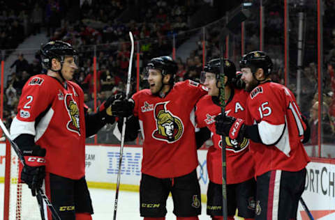 Feb 11, 2017; Ottawa, Ontario, CAN; Ottawa Senators forward Zack Smith (15) reacts with teammates after scoring a goal against the New York Islanders during the second period at Canadian Tire Centre. Mandatory Credit: Eric Bolte-USA TODAY Sports